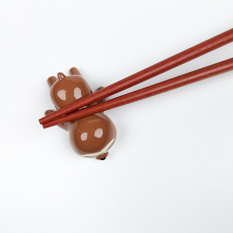 Dovent japansk spisepinde-støtte