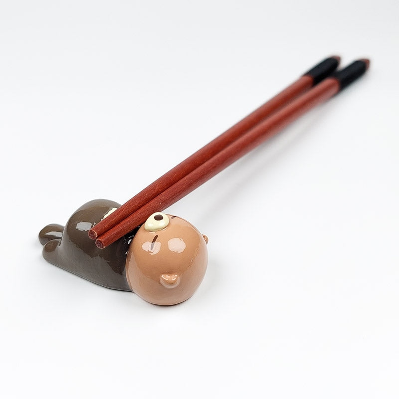 Japansk odder spisepindeholder