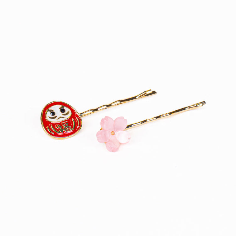 Japanske hårspænder med Daruma og Sakura-motiv