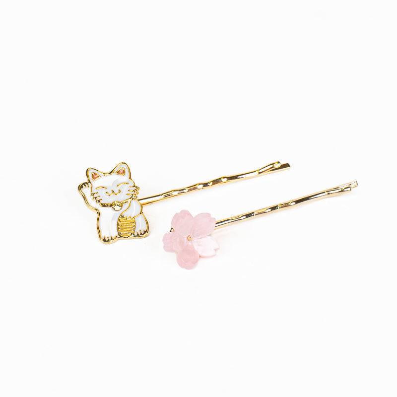 Japanske hårspænder med Maneki-Neko og Sakura-motiv