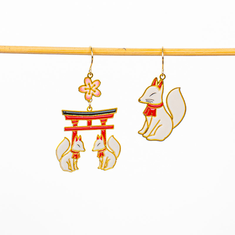 Japanske øreringe med Torii og Kitsune-motiv