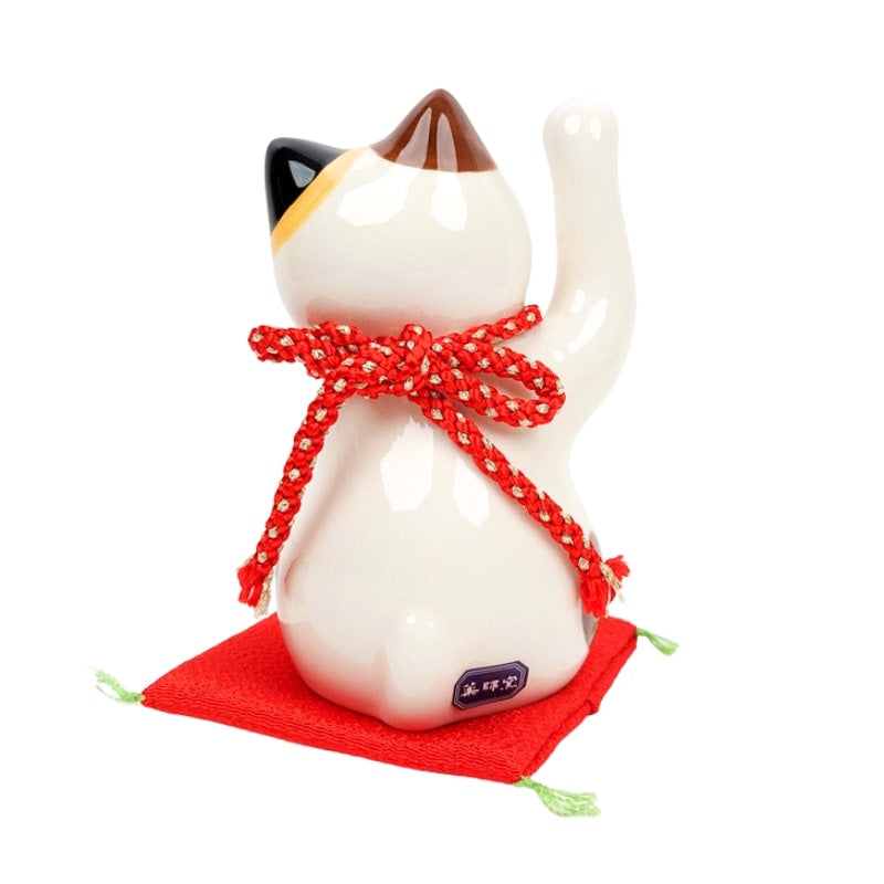Maneki Neko højre pote