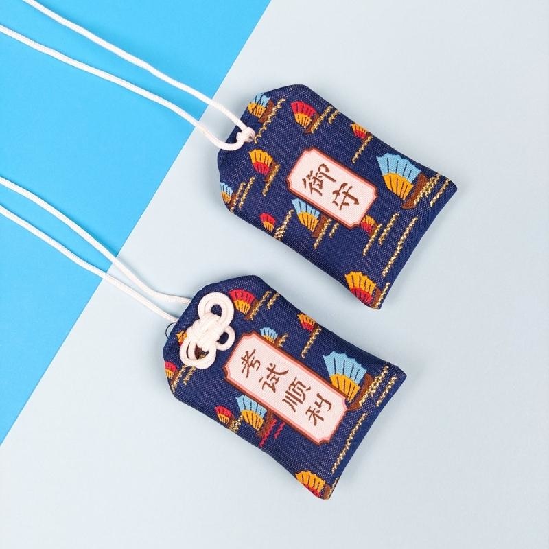 Omamori bestået eksamen