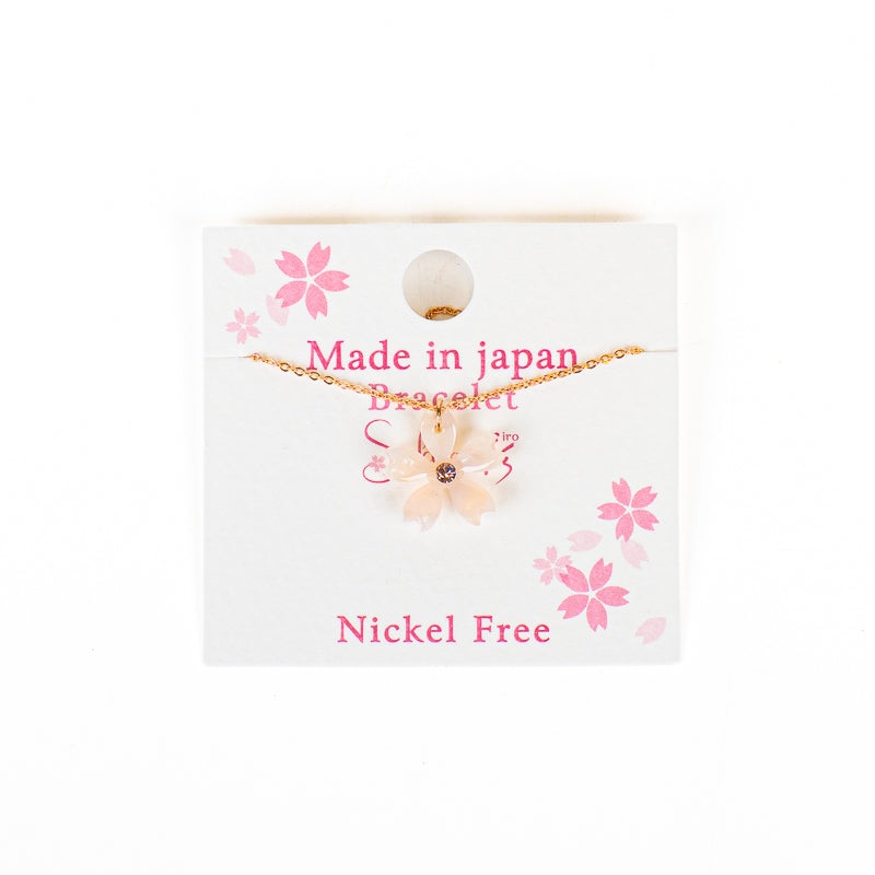 Japansk armbånd med hvid sakura-blomst