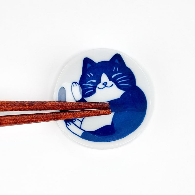 Japansk spisepindeholder med kat