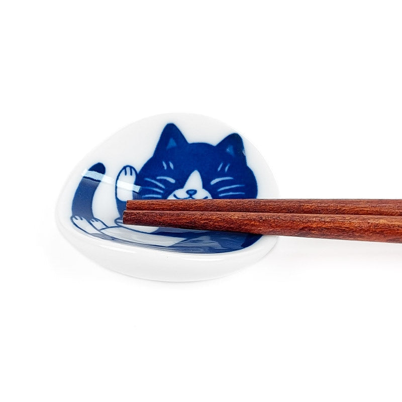 Japansk spisepindeholder med kat