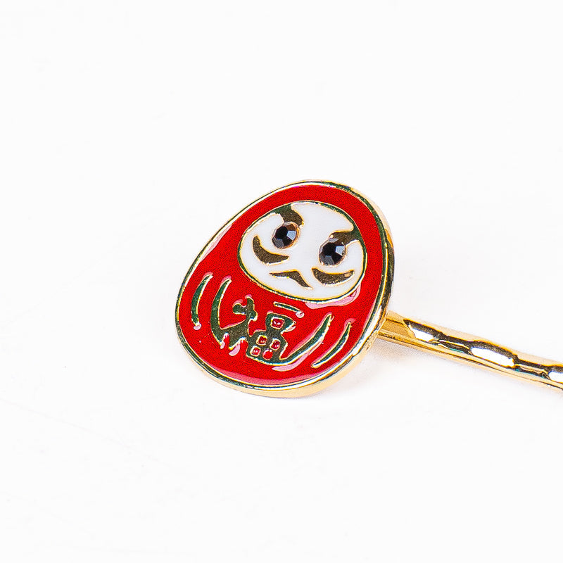 Japanske hårspænder med Daruma og Sakura-motiv