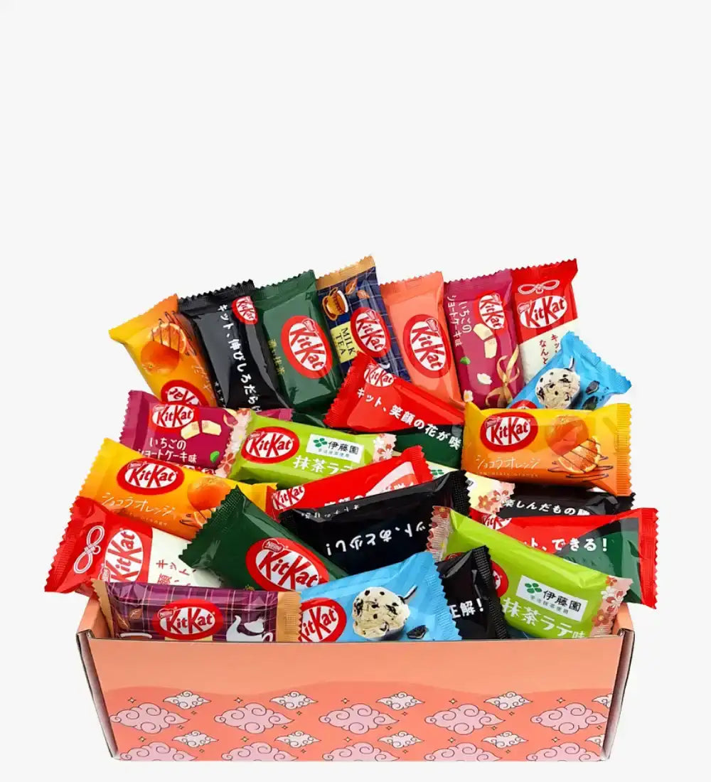 Boîte de bonbons Kitkat avec des emballages colorés et des designs japonais.
