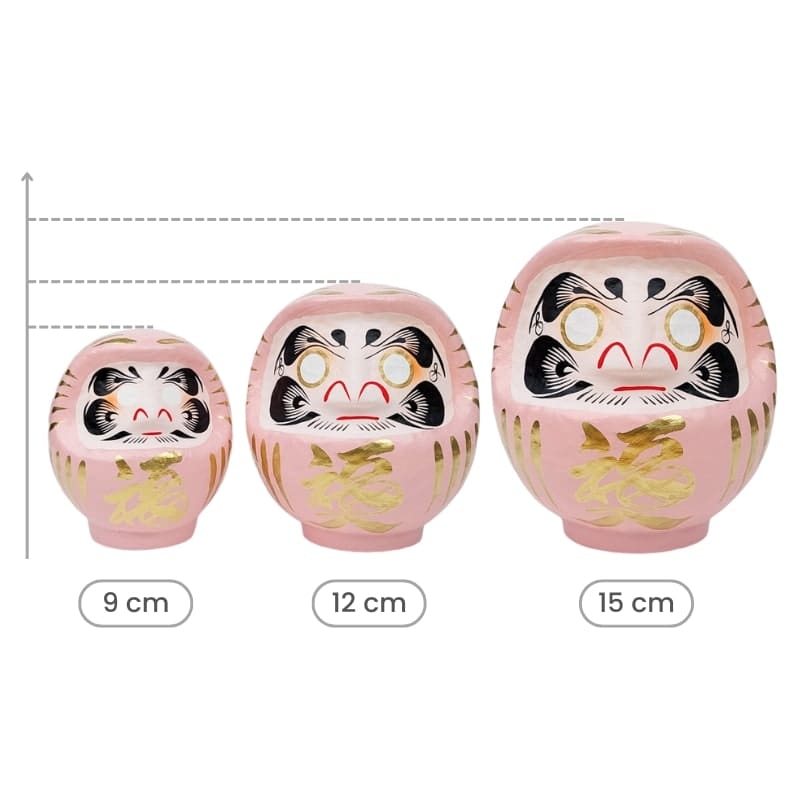 Lyserød japansk daruma - 9 til 15 cm