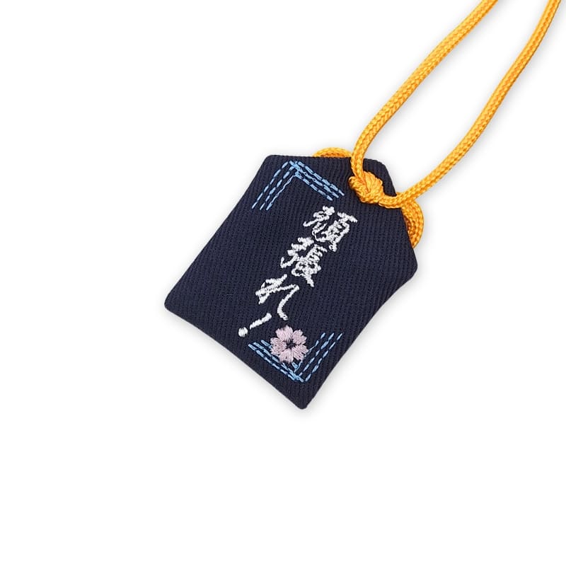 Omamori sort amulet til akademisk succes