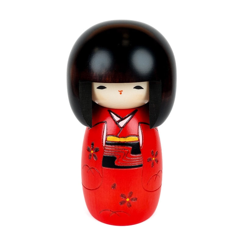 Rød Kokeshi-dukke