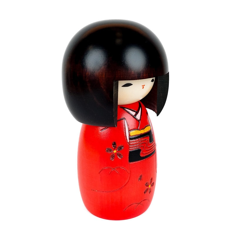 Rød Kokeshi-dukke